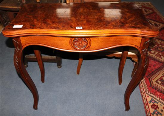 A 19th century French walnut serpentine tea table, W.85cm